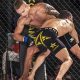 From Wrestling Mat to MMA Cage: A Transition Guide | Ultimate Guide to MMA: Training, Techniques, and Top Fighters in The World